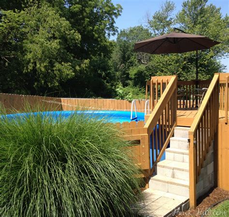 Endless pools offers a few exterior stair options. Hiding a Big Blue Above Ground Pool in a Landscaped ...