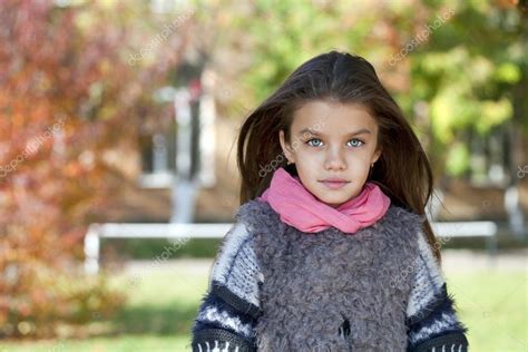 Beautifal Little Girl In The Autumn Park ⬇ Stock Photo Image By