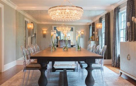 Dining Room With Floor To Ceiling Antiqued Mirrored Accent