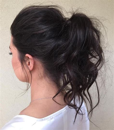30 Eye Catching Ways To Style Curly And Wavy Ponytails Messy Ponytail