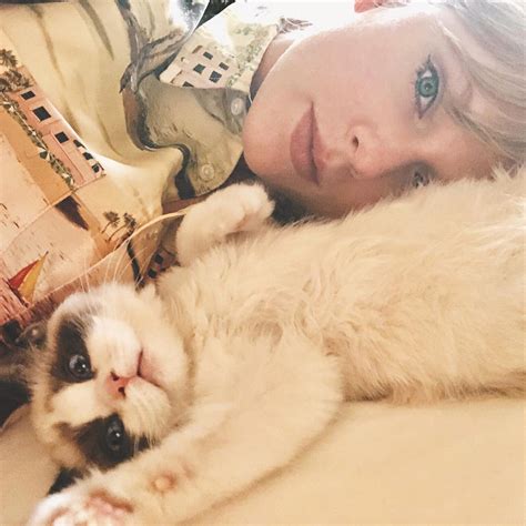 Feline Fashion Taylor Swifts Cat Takes The Spotlight On Time Magazine