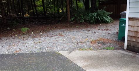 On top of that i'm going to grade the side of my yard away from the house to help keep the water away. drainage - Can I regrade this gravel section of yard myself? - Home Improvement Stack Exchange