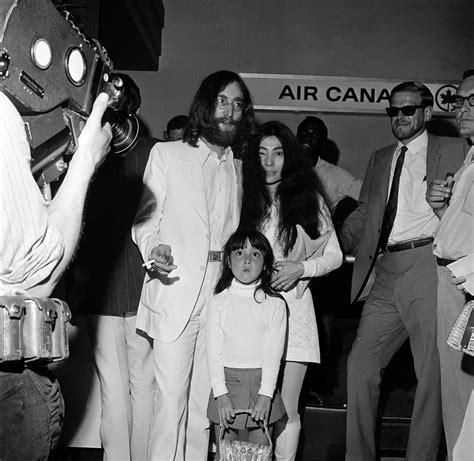 John Lennon His Companion Yoko Ono And Onos Daughter Kyoko At An
