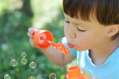 Boy Blowing Bubbles Stock Photo Image Of Kiddy Summer 54772272