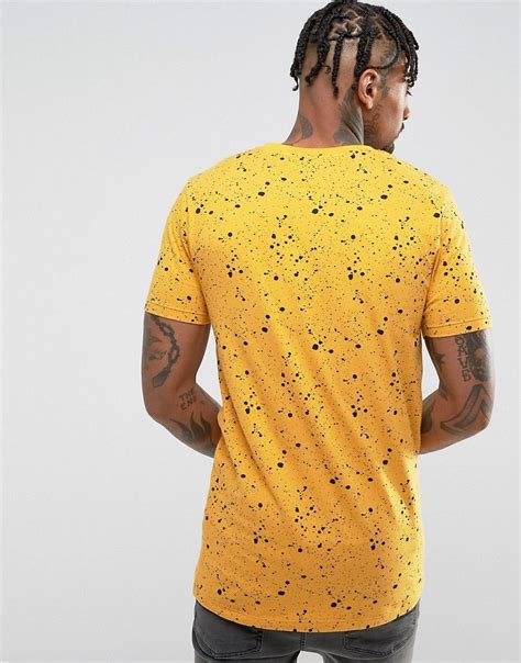 Asos Longline Muscle T Shirt With Splatter Print In Yellow Yellow