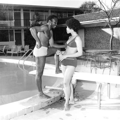 Florida Memory • African American Couple Chatting Poolside
