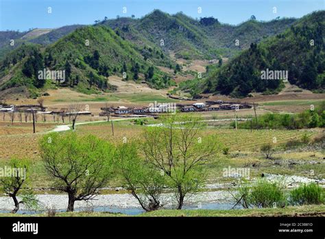Countryside Landscape North Korea Village And Mountains At Background