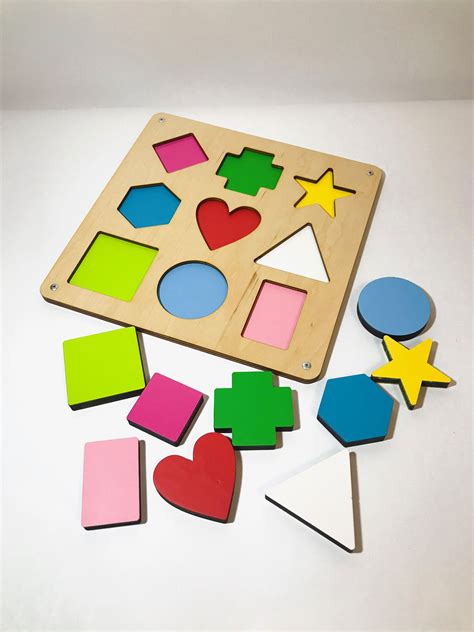 Wooden Shape Puzzle Adults The Puzzle Also Has Its Name And Piece Count Printed On The Side
