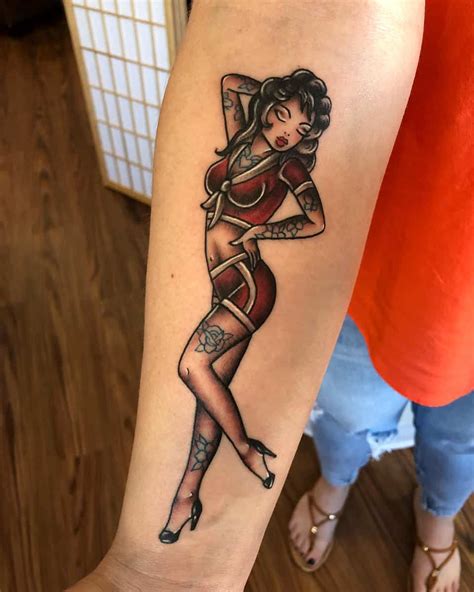 the top 51 pin up girl tattoo ideas [2021 inspiration guide]