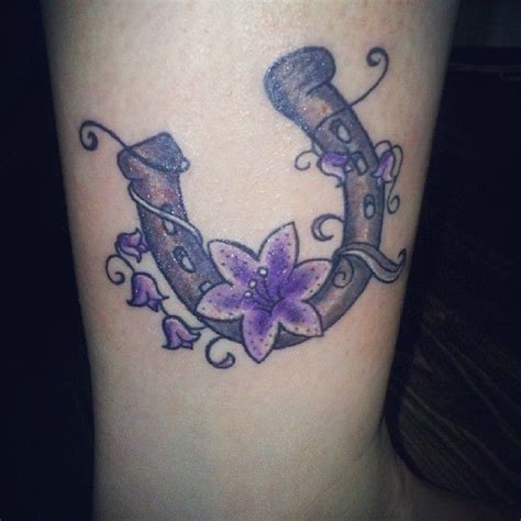 Horseshoe With Purple Flowers Tattoo Tattooimagesbiz