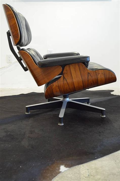 Billy wilder chaise lounge chair designed by charles and ray eames, black aluminum frame, black leather cushion. Vintage 1970s Rosewood Eames 670 Lounge Chair For Sale at ...