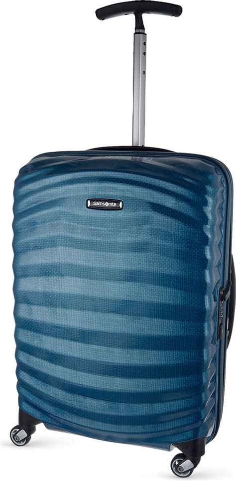 Lyst Samsonite Lite Shock Spinner 55 Four Wheel Cabin Suitcase In Blue