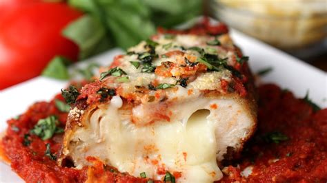 Place each chicken breast on a plate and pile mound of salad on top. Stuffed Chicken Parmesan - YouTube