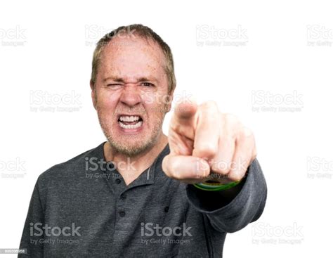 Angry Man Shouting And Pointing And Accusing Finger Stock Photo