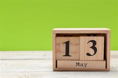 Premium Photo Cube Calendar For May 13th On Wood With Copy Space