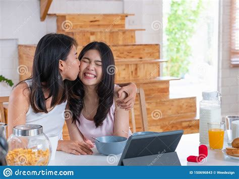 Happy Asian Couple Lesbian Getting Marriage And Showing Ring To Friend