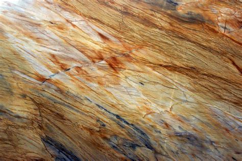 Natural Stone Marble Texture In Yellow With Gray Streaks And Stripes