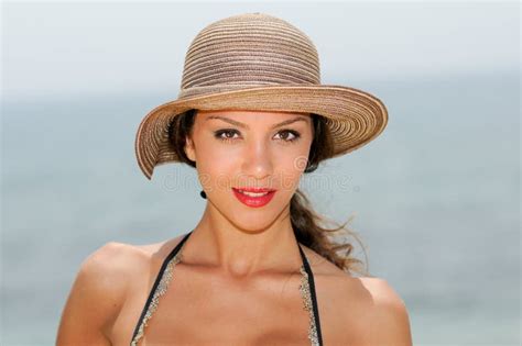 Attractive Woman Smiling With A Sun Hat On A Tropical Beach Stock Photo Image Of Fashion