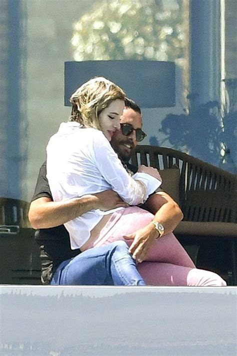 Scott Disick And Bella Thorne Get Close In Cannes With Poolside Kisses