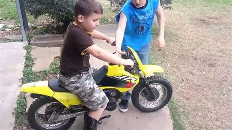 Little Boy Crashes Dirt Bike Into Fence Youtube