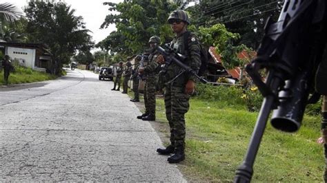 Milf Rebels Hand Over Arms In The Philippines Bbc News
