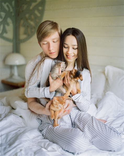 Couple With Kittens On Bed By Stocksy Contributor Duet Postscriptum