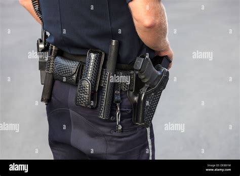 Equipment Belt Of An American Uniformed Police Office Showing His Stock