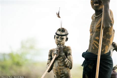 Portrait Of The Mursi Tribe Man With The Body Painting Sexiezpicz Web