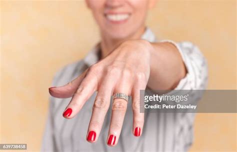 Mature Woman Finger Up Photos And Premium High Res Pictures Getty Images