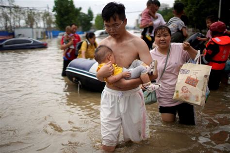 Tens Of Thousands Taken From Flood Hit Central China Deaths Rise