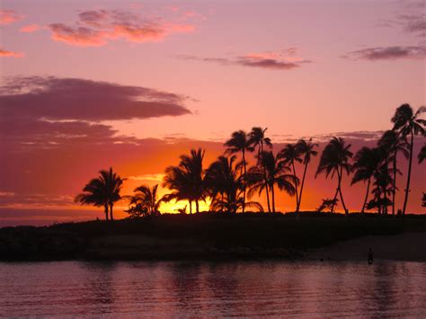 best beach to watch sunset in oahu photos