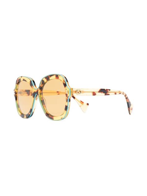 gucci eyewear tortoiseshell effect oversize frame sunglasses farfetch