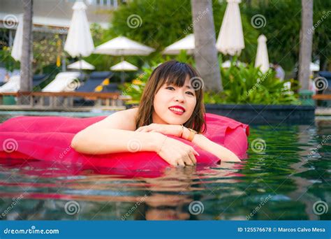 Young Happy And Attractive Asian Chinese Woman Enjoying At Holidays