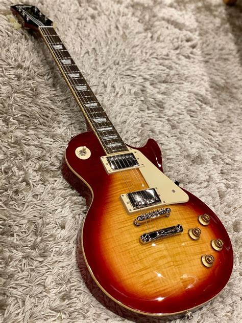 The epiphone les paul special is part of epiphone's new inspired by gibson collection and is designed to recreate the sound of the rare single cutaway 1950s era gibson les paul special. Epiphone Les Paul Standard `50s - Heritage Cherry Sunburst