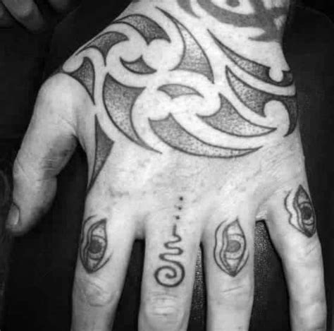 This is a stunning tattoo and it makes an elegant statement. 40 Tribal Hand Tattoos For Men - Manly Ink Design Ideas