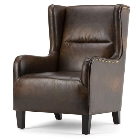 Order your hand built leather wing chair today! Simpli Home Taylor Distressed Brown Bonded Leather Wing ...