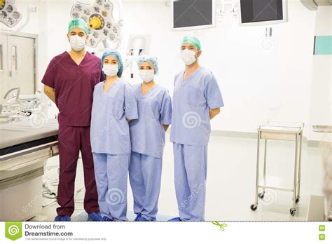 Team Of Surgeons In An Operating Room Stock Photo Image Of Male