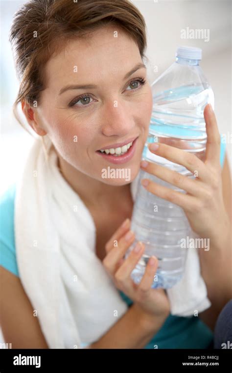 Portrait Of Fitness Woman Drinking Water Stock Photo Alamy
