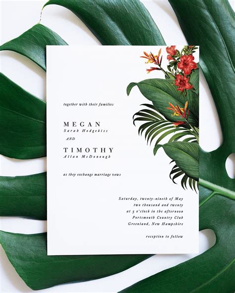 minimalist tropical wedding invitation with banana leaf backer and monogram layout designed by