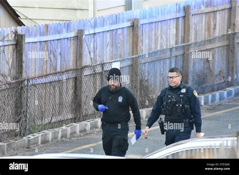 Belleville, New Jersey, USA. 16th Dec, 2023. Police officers search for