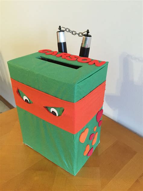 Using empty tissue and cracker boxes, form a square hippo head, then decorate with paint or patterned paper. Teenage Mutant Ninja Turtle Valentine Box #TMNT #turtle # ...