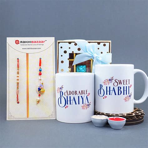 Send Bhaiya Bhabhi Rakhi With Mugs N Assorted Chocolates Online