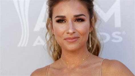 Jessie James Decker Posts A Photo Of Herself Holding A Wine Flute While
