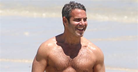 andy cohen s muscles are insane see his hot shirtless beach body e online