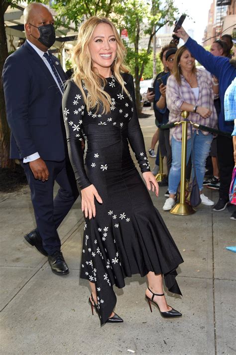 hilary duff is all smiles as she arrives back to her hotel after 2022 abc disney upfront in new