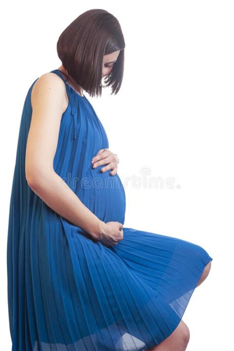 Sensual Relaxed Caucasian Pregnant Brunette Woman Isolated Over White