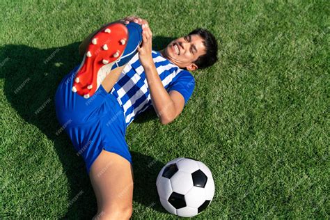 Premium Photo Football Soccer Player Accident Knee Injury Sport
