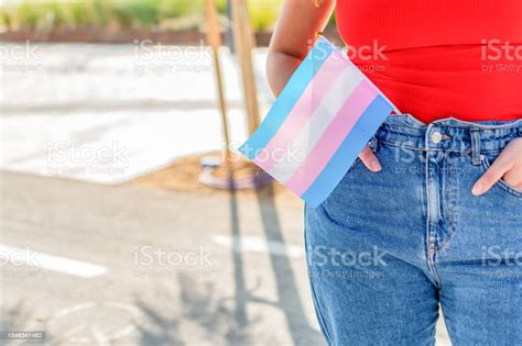 Gender Queer Woman Hold Transgender Flag During Pride Month Celebration