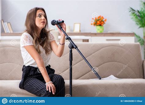 The Female Beautiful Musician Singing At Home Stock Image ...