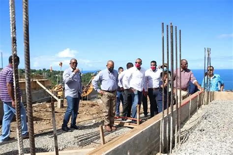 skerrit and austrie speak on the 17 resilient houses in canefield east dom767